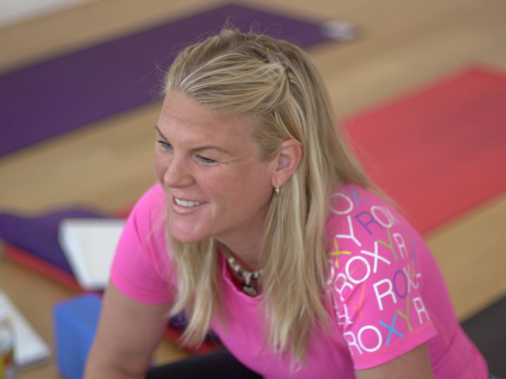 Meredith smiling during yoga